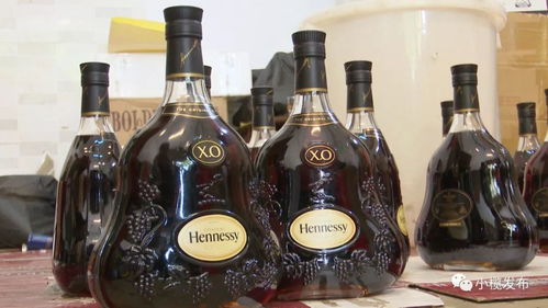 小榄镇查处一制售假洋酒黑窝点 查获假冒马爹利 尊尼获加 轩尼诗等......